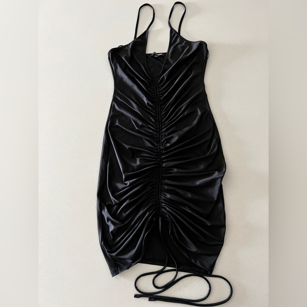Woman’s black fashion nova dress. Size small, worn only once like new.